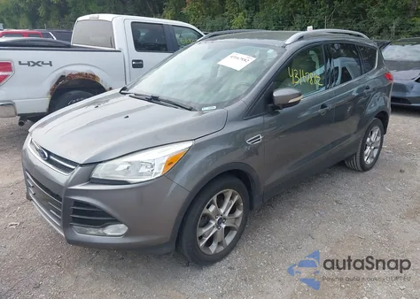 2014 Ford Escape Titanium z USA, uszkodzony, nr VIN 1FMCU0JX4EUE36925